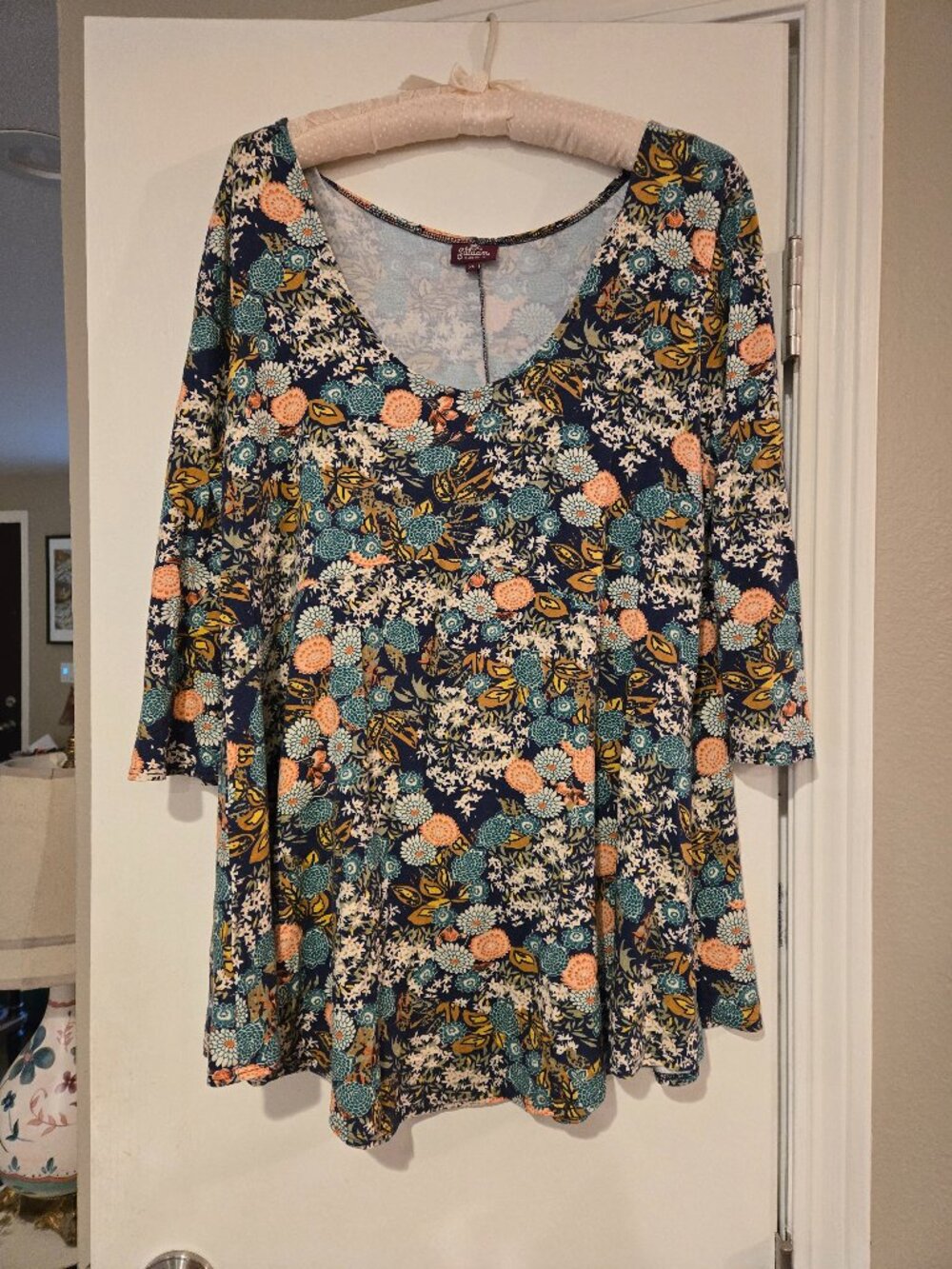 Two size XL Salaam tops, colorful floral patterns, 3/4 sleeves